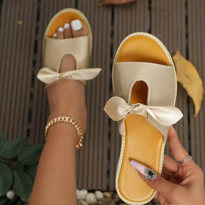 Whimsical Golden Bow Slide Sandals